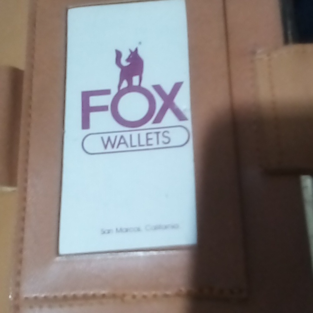 Fox genuine leather checkbook wallet. EUC.caramel colors.